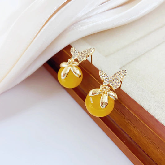 925 silver needle butterfly earrings for women, 2025 new trend explosion, cold temperament, small public yellow agate