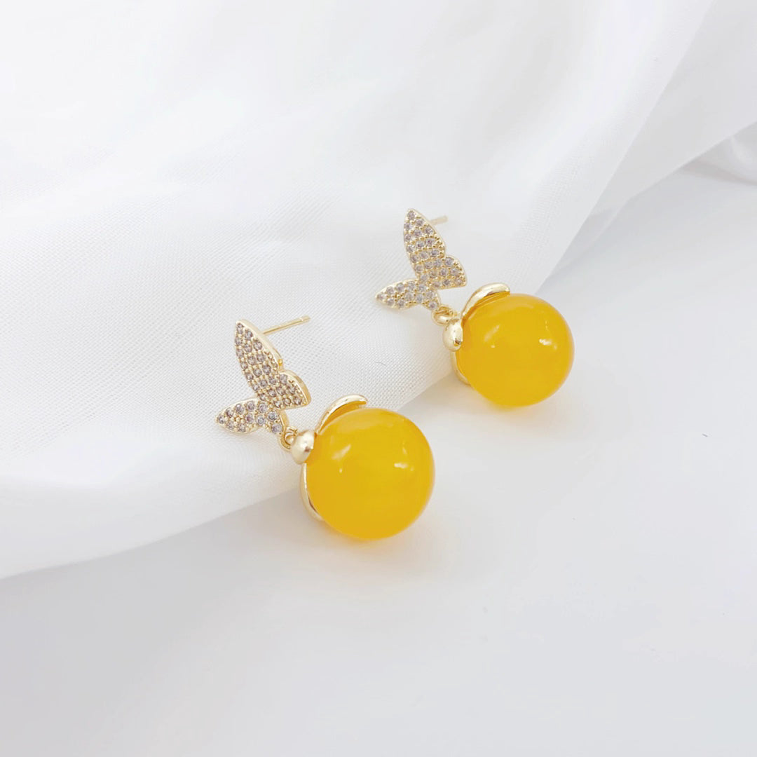 925 silver needle butterfly earrings for women, 2025 new trend explosion, cold temperament, small public yellow agate