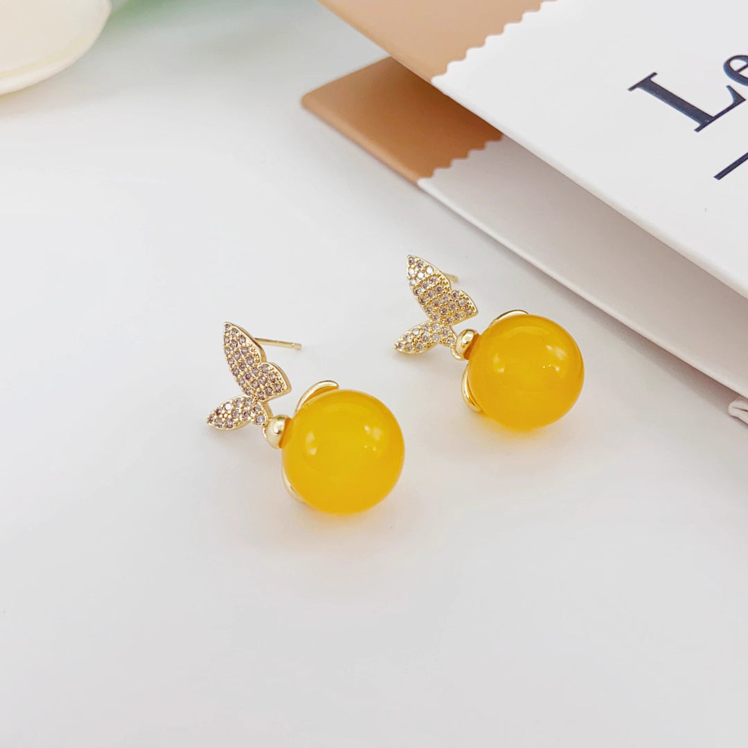 925 silver needle butterfly earrings for women, 2025 new trend explosion, cold temperament, small public yellow agate
